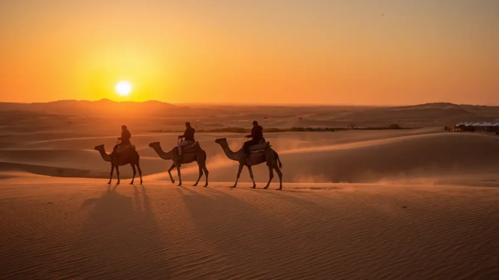 Camel ride at sunset during an 8 day Morocco tour from Casablanca